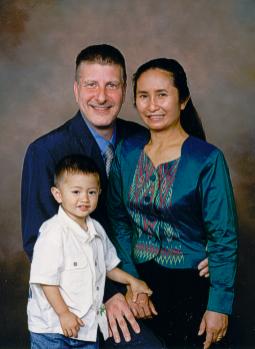 Curtis Vancura and his wife Boonlai and son John